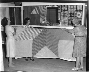 Primary view of object titled '[Quilting Booth]'.