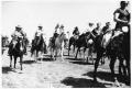 Photograph: Texas Sesquicentennial Wagon Train on Its Way to Kingsville