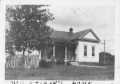 Photograph: [The W.C. Czigan's Home, a fence to the left of the house]