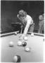 Photograph: Student Playing Pool in the Student Center