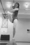 Thumbnail image of item number 1 in: 'Female Gymnastics Student Performing on Balancing Beam'.