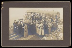 Primary view of object titled '[Annie Belle Emery Bright and group with Pikes Peak Cog railway car]'.