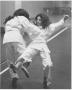 Thumbnail image of item number 1 in: 'Two Female Students Sparring in Karate Class'.