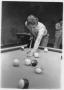 Photograph: Student Shooting Pool in the Student Center