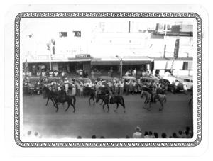 Primary view of object titled 'Riders on Horseback in Parade'.
