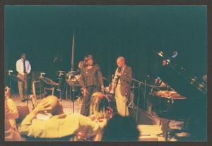 Primary view of object titled '[Roger Boykin on Stage with Ensemble]'.