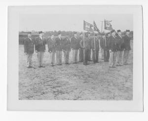 [Servicemen Standing at Attention with Flags]