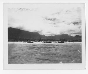 Primary view of object titled '[Servicemen Offloading Supplies Onshore]'.