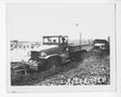 Primary view of [Servicemen Driving Trucks in Convoy]