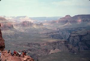 [Group of People Sitting on the Ground in the Grand Canyon]