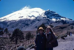 [Two Women Standing in Front of a Mountain in Mexico]