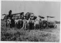 Photograph: Alton, Guy and Wylie Reeves and Others with Tractors in the Field