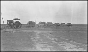 [Tractor and grain wagons]