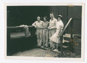[Servicemen and Nurses Standing on Steps]