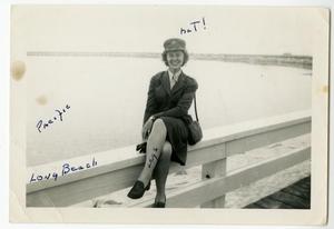 [Marjorie L. Jackson Sitting on a Fence in Marine Corps Uniform]