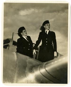 Primary view of object titled '[Lorna Lose & Judy Fuller Standing in Plane Cockpit]'.