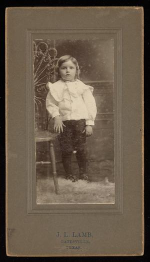 [Portrait of an Unknown Child Next to a Chair]