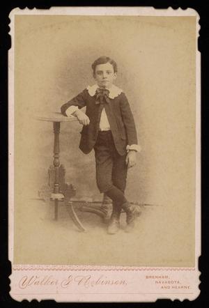 [Portrait of an Unknown Boy Next to a Table]