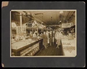 Primary view of object titled '[F. W. Woolworth Store with Group of Women, Bonham]'.