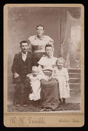 [Portrait of Dan, Sallie, Their Two Children, and Mary]