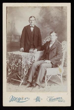 Primary view of object titled '[Portrait of Two Unknown Men and a Wicker Chair]'.