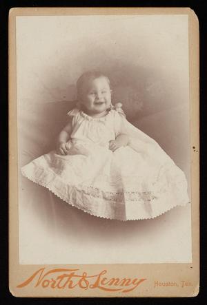 Primary view of object titled '[Portrait of a Smiling Infant in a White Gown]'.