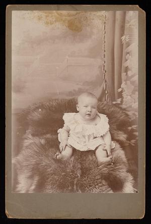 [Portrait of an Unknown Child Sitting on a Fur Blanket]