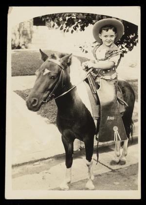 Primary view of object titled '[Robert Parker Kelly, Jr., Riding a Pony]'.