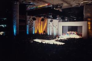 Primary view of object titled '[Apparel Mart Fashion Show, Models Gathered on Stage]'.