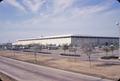 Thumbnail image of item number 1 in: '[Apparel Mart from Interstate 35E, Looking North]'.