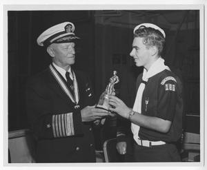 [Fleet Admiral Chester W. Nimitz Receives a Statuette]