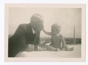 Primary view of object titled '[Captain Chester W. Nimitz and Baby]'.