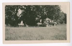 [The Nimitz' Car and Tent in a Field on Family Trip]