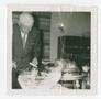Photograph: [Chester W. Nimitz at Dinner Table]