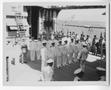 Photograph: [Unidentified U.S. Naval Officers Lined Up on Unknown Ship]