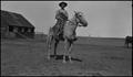 Photograph: [Man on horseback]