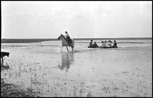 Primary view of object titled '[Rafting on a playa lake]'.