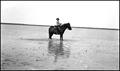 Photograph: [Boy on horseback]