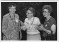 Photograph: [Three women talking during a North Texas Homecoming event]