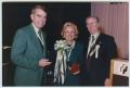 Primary view of [Chancellor Alfred F. Hurley with Golden Eagle alumnus Walter Abbey and Joanna Hurley]