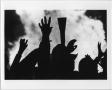 Primary view of [Eagle talon salute silhouettes at North Texas Homecoming bonfire, 1980]