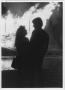 Thumbnail image of item number 1 in: '[Couple silhouetted against North Texas Homecoming bonfire, c. 1980]'.