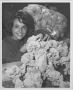 Photograph: [Student with paper flowers, c. 1960]