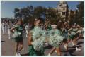 Primary view of [North Texas Dance Team in the Homecoming Parade, 1992]