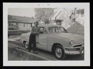 Primary view of object titled '[Ralph W. Thornton with His 1954 Ford Sunliner]'.