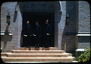 [Photograph of Three Graduates]