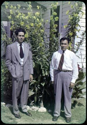 [Photograph of Henry Camacho and Reverand J.L. Leos]