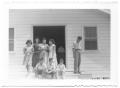 Photograph: [Group of Young Hispanic Boys and Girls on a Porch]