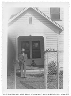 [Man and Tricycle in front of Presbyterian Manse in San Pablo]