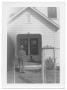Photograph: [Man and Tricycle in front of Presbyterian Manse in San Pablo]